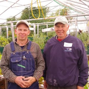 Jeff and Earl Hafner in aquaponics greenhouse
