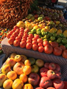 Rhizosphere farm several varieties of heirloom tomatoes at market