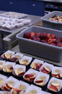 Locally grown apples being prepared for kids