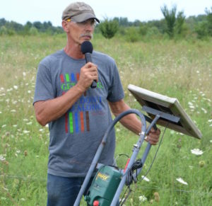Russ Wischover speaking at his 2017 PFI field day