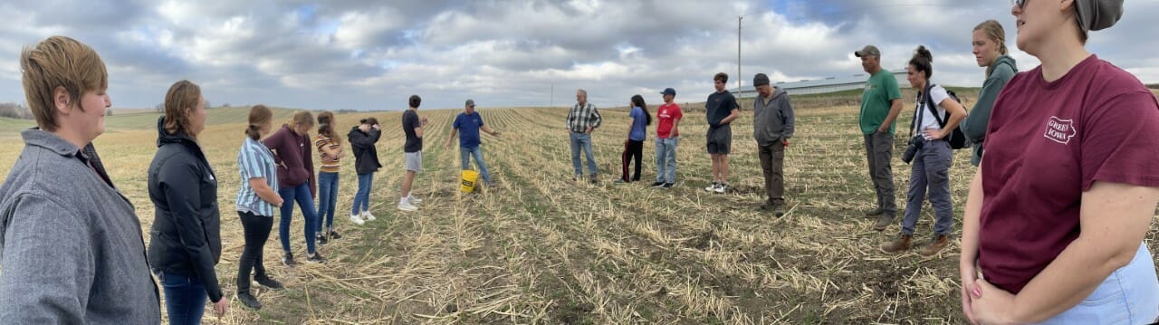 Student circle in cover crop