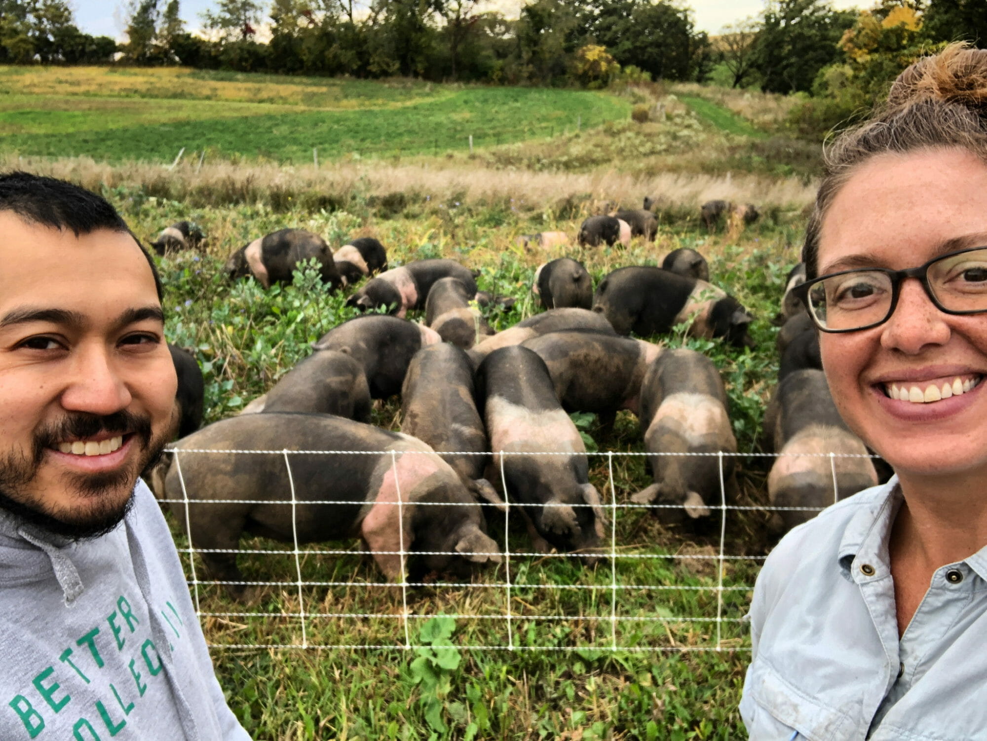 Nick Nguyen and Dayna Burtness with their pigs