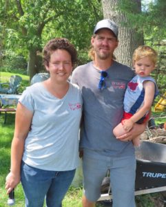 Nathan and Emily Paulsen with their son.