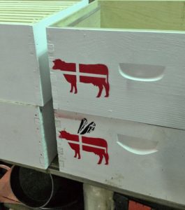 The Paulsens adapted their Brun Ko logo to fit the bee theme on their hive boxes