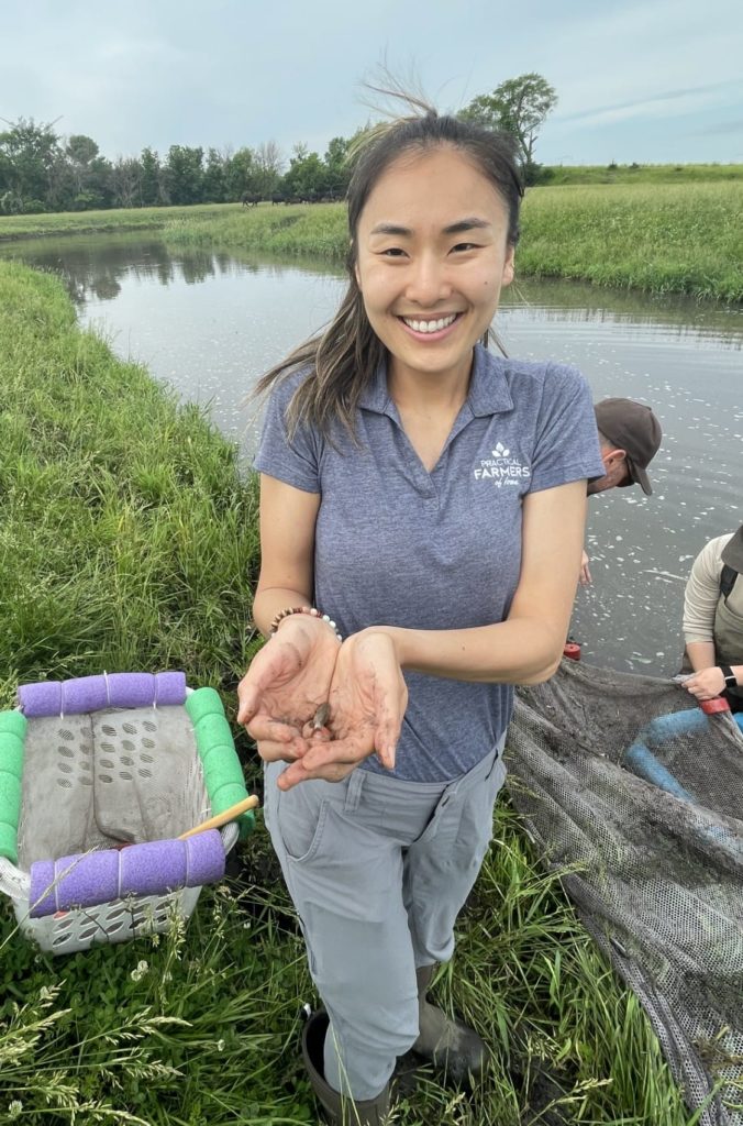 Grace Yi of PFI proudly displays one of the catches of the day!