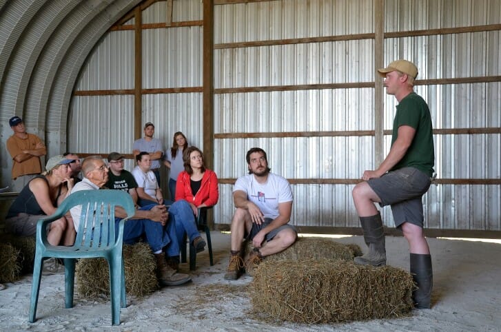 Jason Grimm introduces his family's farm at the field day.