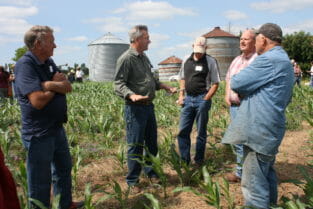 Doug leads a small discussion on using no-till tactics in organic production.
