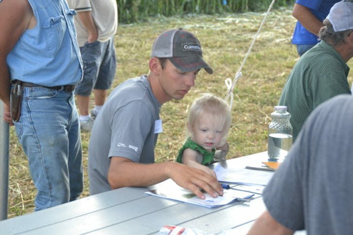 Robert Alexander teaches the next generation about cover crops.