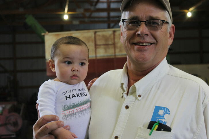 Tenoch Terrazas, perhaps PFI's youngest cover crop advocate, pauses for a photo op with the host.