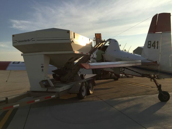 Loading up the airplane for aerial seeding on Sept. 2, 2015.