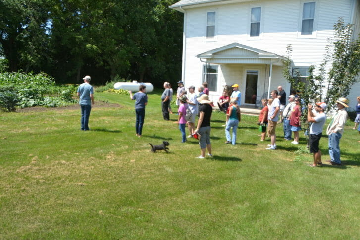 Attendees tour Fork Tail Farm during the first stop on this two-part field day.
