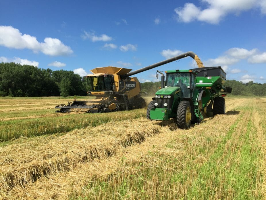 Darren Fehr harvests oats on his farm near Rolfe. Photo courtesy of Darren.