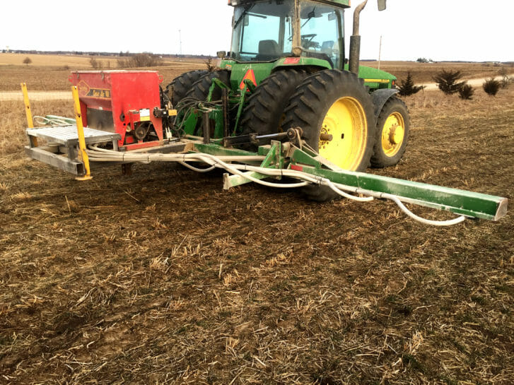 Doug Alert built this dedicated toolbar for frost seeding red clover. It’s a Gandy Orbit-Air seed hopper mounted on a used sprayer boom with a hydraulic metering system.
